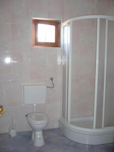 Kúpeľňa v ubytovaní Apartments Dada