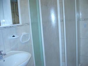 Kúpeľňa v ubytovaní Apartments Dada