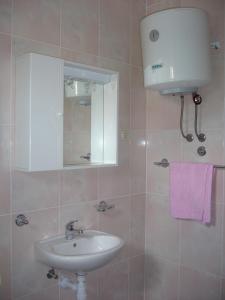 Kúpeľňa v ubytovaní Apartments Dada