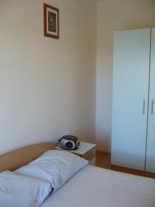 Posteľ alebo postele v izbe v ubytovaní Apartments Dada