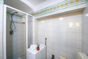 a bathroom with a toilet and a shower at Lu Penniell in Amalfi +16 photos