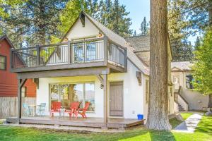 a house with a deck and a patio at Lakeview Manor in South Lake Tahoe