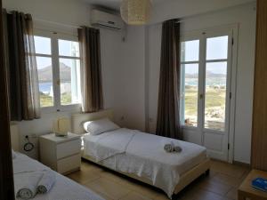 Postel nebo postele na pokoji v ubytování Gio st Gio apartment 1 Antiparos st.Giorgio