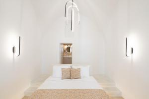 Letto o letti in una camera di Asha Luxury Suites