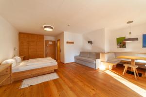 Letto o letti in una camera di Hotel Greif