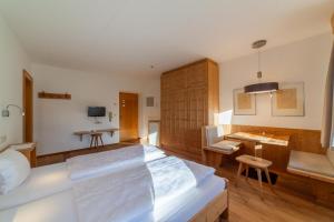 Letto o letti in una camera di Hotel Greif