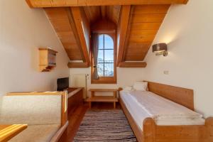 Postel nebo postele na pokoji v ubytování Hotel Greif