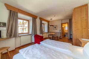 Letto o letti in una camera di Hotel Greif
