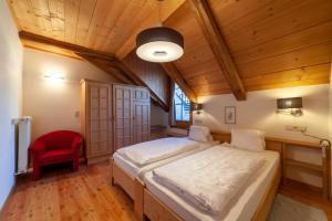 Letto o letti in una camera di Hotel Greif