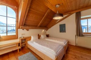 Letto o letti in una camera di Hotel Greif