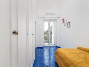 Posteľ alebo postele v izbe v ubytovaní Santoro Suite - De Vivo Realty Sorrento + 32 fotografií