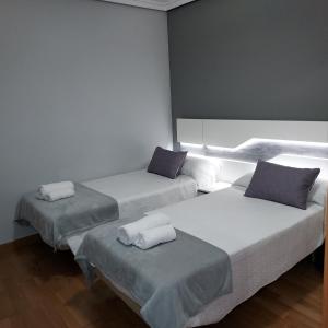 Ein Bett oder Betten in einem Zimmer der Unterkunft RUA ZAPATERIA 10 PLASENCIA