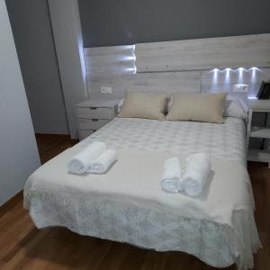 Posteľ alebo postele v izbe v ubytovaní RUA ZAPATERIA 10 PLASENCIA