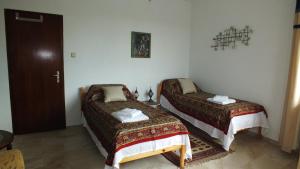 A bed or beds in a room at LussVelika: The heart of the Black Sea.
