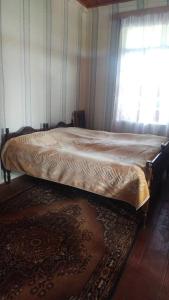 Voodi või voodid majutusasutuse Tasia Guesthouse toas