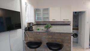 Kuchyň nebo kuchyňský kout v ubytování Lavanda Apartment & Studio - Old Town Mali Lošinj