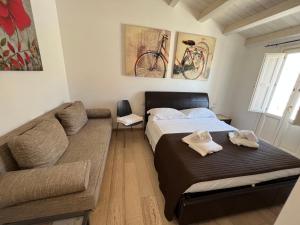 Postel nebo postele na pokoji v ubytování Plaza Rooms