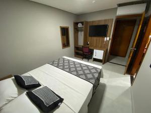 Katil atau katil-katil dalam bilik di VIPPER Hotel