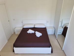 Postel nebo postele na pokoji v ubytování APPARTAMENTO VILLA MARIA