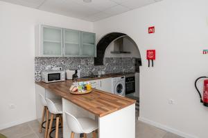 Kuchyň nebo kuchyňský kout v ubytování Casa dos Avós