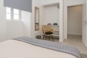 Postel nebo postele na pokoji v ubytování Casa dos Avós