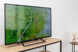 TV a/nebo společenská místnost v ubytování Casa dos Avós