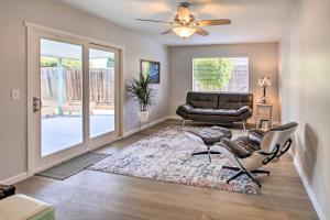 a living room with a couch and a chair at Spacious House with Yard in SLO Wine Country! in San Luis Obispo