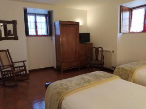 Ένα ή περισσότερα κρεβάτια σε δωμάτιο στο Casa de Sequiade