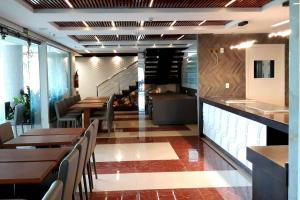 Restaurant o un lloc per menjar a Ramada by Wyndham Manaus Torres Center