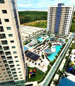 an aerial view of a pool in a resort at Salinas Exclusive Resort in Salinópolis