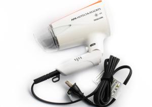 a hair dryer with a cord and a blow dryerimeter at APA Hotel TKP Nippori Ekimae in Tokyo