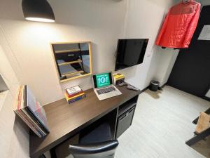 TV a/nebo společenská místnost v ubytování Formosa 101 Taipei Main Branch