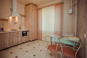 Kuchyň nebo kuchyňský kout v ubytování Molex Apartments 2