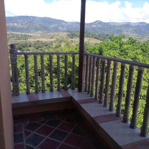 a balcony with a view of the mountains at BONANZA in Monterrey
