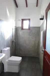 Vonios kambarys apgyvendinimo įstaigoje Sudu Guest