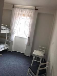 سرير أو أسرّة في غرفة في Hotel Pod Stráží