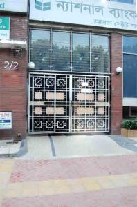a building with a gate in front of it at Marry House in Dhaka