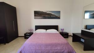 Un pat sau paturi într-o cameră la Borgo Pida