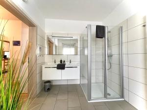 Koupelna v ubytování Schlafen wie Zuhause Monteur und Ferienwohnungen Rahden
