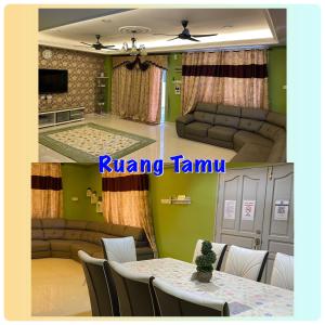 a living room and dining room with a table and couch at D' Corner Islam Homestay in Kuala Kangsar