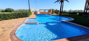 The swimming pool at or close to Apartamento Flamingo by DENIA COSTA