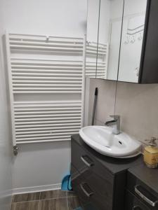 Koupelna v ubytování Schöne Wohnung im Zentrum von Ahnatal