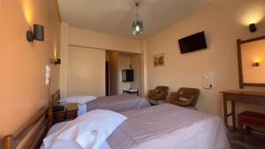 TV a/nebo společenská místnost v ubytování Hotel Cosmos + 37 fotografií