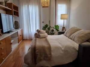 Posteľ alebo postele v izbe v ubytovaní Salamanca Rentals - Apartamento con terraza a 1 minuto de la Plaza Mayor