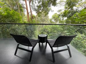 Balkón nebo terasa v ubytování Flora Vythiri Resort Wayanad