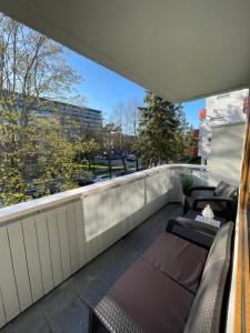 a balcony with a view of a building at Alintoma Holiday apartment in Palanga
