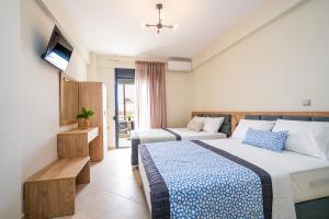 A bed or beds in a room at Villa MARIA