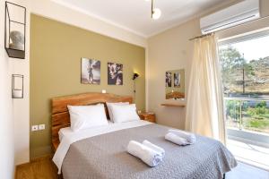 Posteľ alebo postele v izbe v ubytovaní Oreon Suites - Usia
