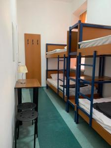 Poschodová posteľ alebo postele v izbe v ubytovaní Schronisko na Wyspie