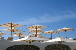 a group of umbrellas on top of a building at La Residenza Capri in Capri